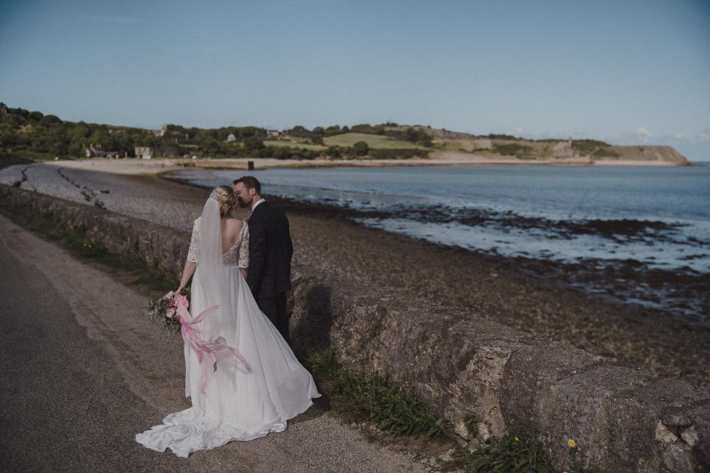 Bride and groom near Beaumaris, from an Anglesey Wedding Photographer