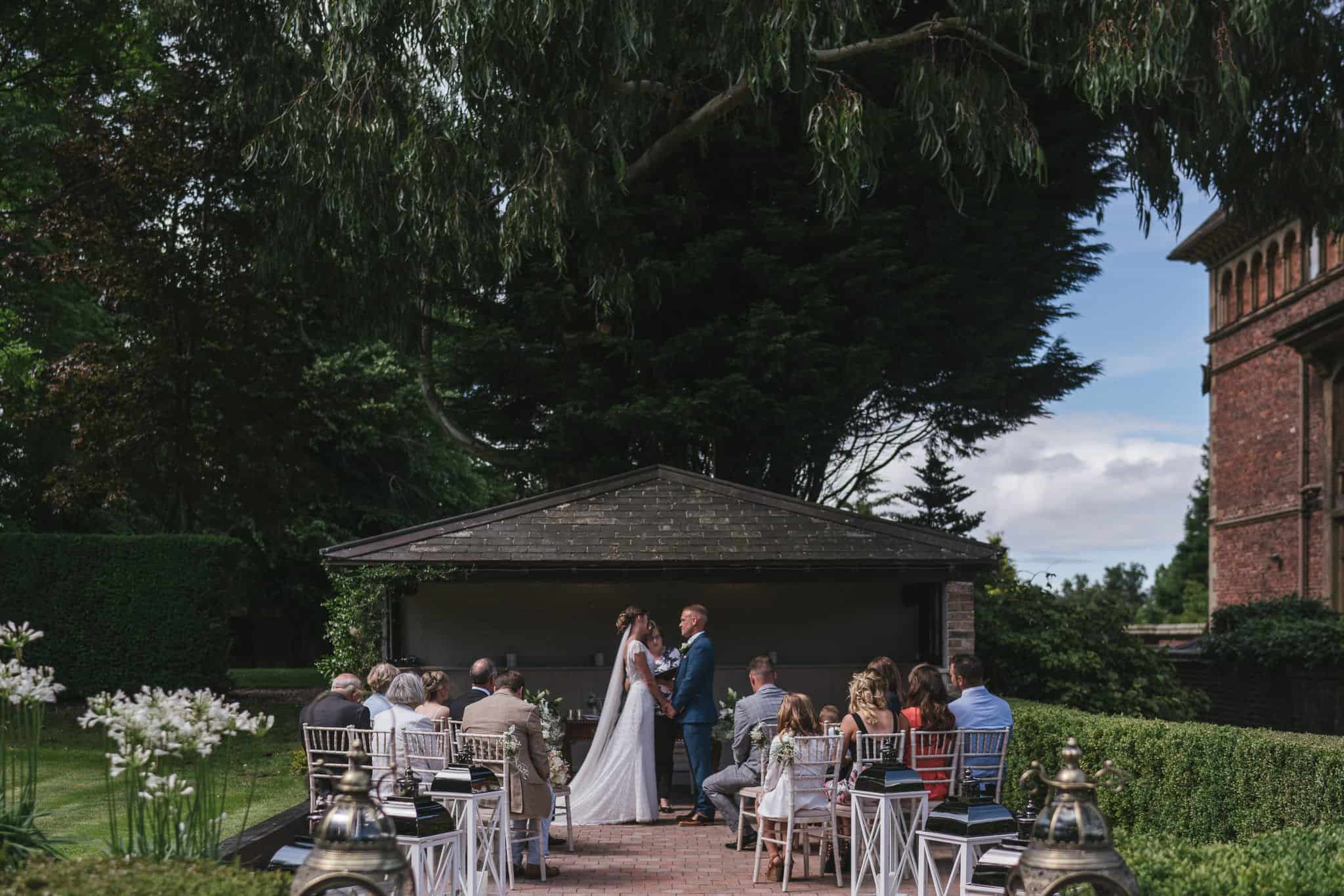 Outdoor ceremony Soughton Hall Wedding Photographer