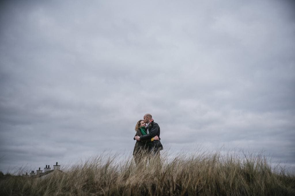 Chimneys of the Llanddywn Island Pilot Cottages are just visible, from an Anglesey Wedding Photographer